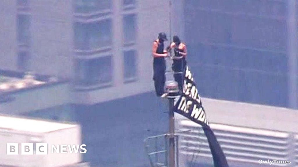 Two Climbers Scale Empire State Building Spire in Viral Stunt